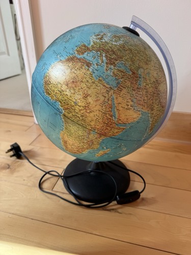 Large world globe stand - on,